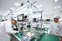 SK Group đã trở thành đối tác chiến lược của Vingroup sau thương vụ mua cổ phần. Trong ảnh: Nhà máy của VinSmart thuộc Kl994 game bài casino hấp dẫn Vingroup. Ảnh: Hoàng Anh