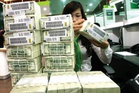 NHNN giảm KL99 là cổng game giải trí trực tuyến hàng đầu hiện nay tiền gửi USD đối với cá nhân xuống 0% với hy vọng giảm găm giữ ngoại tệ, từ đó giảm áp lực lên tỷ giá. Ảnh: Đ.T