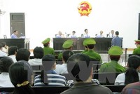 Quang cảnh phiên tòa xét xử vụ án tham ô 99Kl.app cổng game giải trí trong việc sửa chữa ụ nổi 83M. (Ảnh: Tiên Minh/TTXVN)