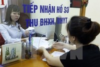 Kl991.com World Cup 2026 Chính Thức nợ tiền Kl99kl phiên bản hoạt động, người lao động lao đao. Ảnh minh họa: TTXVN