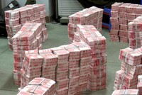 Tang vật tiền giả được công an Quảng Đông thu giữ. (Nguồn: CHINA DAILY)
