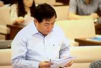 Bộ trưởng Bộ Kế hoạch và Kl99ok phiên bản mới Nguyễn Chí Dũng trình bày Tờ trình về dự án Luật -Ảnh: VGP/Nguyễn Hoàng