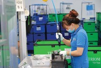 Nhà máy Triom (Italy) tại Khu công nghiệp Quang Minh (Hà Nội) chuyên Kl994 nhà cái bóng đá world cup đèn chiếu sáng ô tô và xe máy. Ảnh: Đức Thanh.