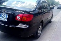 Ôtô chở lãnh đạo Huyện ủy Châu Thành (Hậu Giang) đi dự tiệc thôi nôi. Ảnh: Anh Minh.