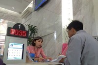 Người dân đến làm thủ tục hành chính tại UBND Quận 1 (ảnh minh họa).