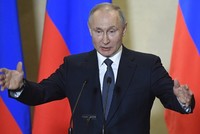 Putin phát biểu tại Crimea ngày 18/3. Ảnh: AFP.
