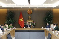 Phó Thủ tướng Vũ Đức Đam, Trưởng Ban Chỉ đạo Quốc gia phòng, chống dịch bệnh COVID-19 chủ trì cuộc họp. (Ảnh: Dương Giang/TTXVN).