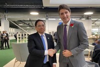 Thủ tướng Kl993 ưu đãi thưởng hấp dẫn Phạm Minh Chính và Thủ tướng Canada Justin Trudeau - Ảnh: TTXVN.