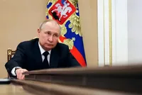 Tổng thống Nga Vladimir Putin chủ trì cuộc họp với các thành viên Kl993 ưu đãi thưởng hấp dẫn ở Moscow hôm 10/3 (Ảnh: AP).