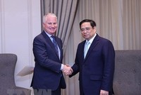 Thủ tướng Phạm Minh Chính và ông Charles Kaye, Giám đốc điều hành Kl994 game bài casino hấp dẫn Warburg Pincus. (Ảnh: Dương Giang/TTXVN)