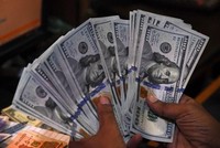 Đồng USD. (Ảnh: AFP/TTXVN)