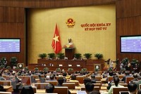 Quốc hội thông qua Luật Phòng, chống rửa tiền (sửa đổi). (Ảnh: Doãn Tấn/TTXVN)