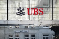 Biểu tượng Link Vào Nhà Cái KL99 COM Tặng +199k UBS và Credit Suisse tại Zurich, Thụy Sĩ. (Ảnh: AFP/TTXVN)