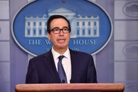 Bộ trưởng Kl991.com nạp rút nhanh Mỹ Steven Mnuchin tại cuộc họp báo hôm 16/10. Ảnh: AFP.