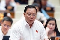 Giám đốc Công an TP Hà Nội - đại biểu Quốc hội Nguyễn Hải Trung (đoàn Hà Nội) thảo luận tại Hội trường chiều 10/6 về dự thảo Luật Các tổ chức tín dụng (sửa đổi).