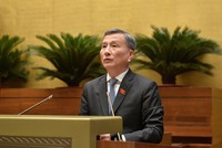 Ông Lê Quang Huy, Chủ nhiệm Ủy ban Khoa học, Công nghệ và Môi trường của Quốc hội trình bày báo cáo thẩm tra dự án Luật Điện lực (sửa đổi) chiều 21/10.