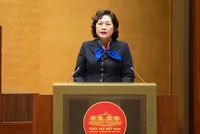 Thống đốc NHNN Nguyễn Thị Hồng trình bày báo cáo tiếp thu, giải trình ý kiến của Ủy ban Thường vụ Quốc hội về dự án Luật Kl99kl phiên bản hoạt động tiền gửi sáng 10/12.