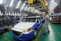 Dây chuyền lắp ráp xe Mazda của Công ty Cổ phần Ô tô Trường Hải trong Khu Kl992 cổng game cá cược mở Chu Lai (Quảng Nam). Ảnh minh họa: TTXVN