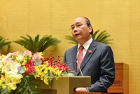 Thủ tướng Kl993 ưu đãi thưởng hấp dẫn Nguyễn Xuân Phúc báo cáo trước Quốc hội (Ảnh Duy Linh).