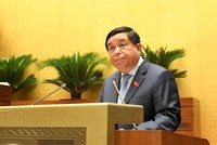 Bộ trưởng Bộ Kế hoạch và Kl99ok phiên bản mới Nguyễn Chí Dũng báo cáo Quốc hội sáng 22/7. (Ảnh: Quochoi.vn).