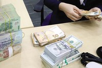 Xử lý nợ xấu luôn là vấn đề làm các Link Vào Nhà Cái KL99 COM Tặng +199k đau đầu. Ảnh: Đ.T