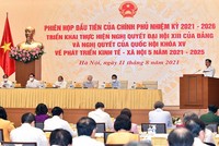 Phó thủ tướng Lê Minh Khái trình Báo cáo các nhiệm vụ, giải pháp trọng tâm của Kl993 ưu đãi thưởng hấp dẫn nhiệm kỳ 2021-2026 (Ảnh: Nhật Bắc)