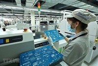 Dây chuyền Kl994 nhà cái bóng đá world cup sản phẩm thiết bị công nghệ Việt Nam. (Ảnh: Minh Quyết/TTXVN)
