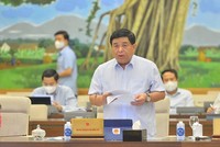 Bộ trưởng Bộ Kế hoạch và Kl99ok phiên bản mới Nguyễn Chí Dũng báo cáo tại phiên họp. 