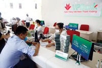 Trong quý III/2021, các Link Vào Nhà Cái KL99 COM Tặng +199k thực hiện nhiều chương trình tín dụng hỗ trợ khách hàng gặp khó khăn do dịch Covid-19. Ảnh: Dũng Minh 