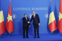 Thủ tướng Phạm Minh Chính và Thủ tướng Ion-Marcel Ciolacu. (Ảnh: VGP/Nhật Bắc)