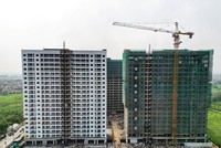 Quy định về quỹ đất thực hiện dự án nhà ở thương mại đã được thảo luận rất nhiều. Ảnh: Đức Thanh
