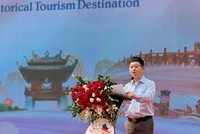 Ông Bùi Duy Quang, Phó giám đốc Trung tâm Xúc tiến Kl99ok phiên bản mới, Thương mại, Du lịch Hà Nội phát biểu tại hội nghị. (Ảnh: Nguyễn Linh)