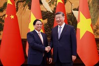 Thủ tướng Phạm Minh Chính hội kiến Tổng Bí thư Ban Chấp hành Trung ương Đảng Cộng sản Trung Quốc, Chủ tịch nước Cộng hòa nhân dân Trung Hoa Tập Cận Bình. (Ảnh: Nhật Bắc)