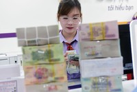 Việc Fed đảo chiều chính sách tiền tệ giúp áp lực lên tỷ giá USD/VND vơi bớt