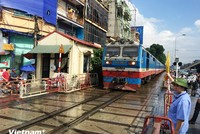 Một đường ngang có gác chắn của ngành 99Kl.app khuyến mãi hot. (Ảnh: Việt Hùng/Vietnam+)