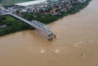 Việc Kl99ok phiên bản mới xây dựng cầu Phong Châu mới nhằm thay thế cầu cũ bị sập. (Ảnh: Tạ Toàn/TTXVN) 