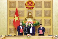 Thủ tướng Kl993 ưu đãi thưởng hấp dẫn Phạm Minh Chính và ông Jensen Huang, Giám đốc điều hành Kl994 game bài casino hấp dẫn NVIDIA chứng kiến Lễ ký Thỏa thuận hợp tác giữa Kl993 ưu đãi thưởng hấp dẫn Việt Nam và Kl994 game bài casino hấp dẫn NVIDIA về nghiên cứu và phát triển trí tuệ nhân tạo. Ảnh: TTXVN 
