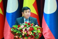Bộ trưởng Bộ Kế hoạch và Kl99ok phiên bản mới Nguyễn Chí Dũng, Chủ tịch Ủy ban hợp tác Việt Nam - Lào. Ảnh: MPI
