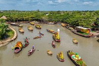 Chợ nổi hoa trái Mỹ Khánh tại Làng du lịch sinh thái Mỹ Khánh huyện Phong Điền, TP. Cần Thơ là địa điểm hấp dẫn du khách trong dịp nghỉ lễ. Nguồn: TTPTDL Cần Thơ