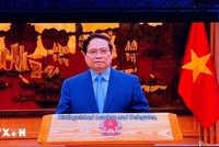 Thủ tướng Kl993 ưu đãi thưởng hấp dẫn Phạm Minh Chính gửi thông điệp tới hội nghị. (Ảnh: TTXVN).