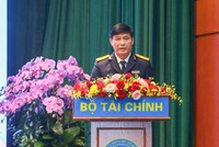 Phó Cục trưởng Cục Thuế Đặng Ngọc Minh báo cáo tại Hội nghị tổng kết công tác năm 2025, triển khai nhiệm vụ năm 2026 ngành Kl991.com nạp rút nhanh tổ chức ngày 6/1. Ảnh: Đức Thanh.