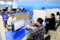 Giải quyết thủ tục hành chính cho người dân tại Trung tâm Phục vụ hành chính công Hà Nội. 