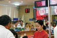 Mở rộng biên độ để tỷ giá… xuống nhanh