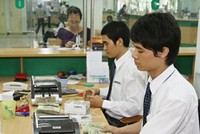  NHNN đang thực hiện một chính sách tiền tệ nới lỏng hơn - Ảnh: Hoài Nam