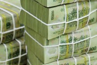 Sức mua của đồng VND vẫn liên tục giảm trên cả thị trường hàng hoá và thị trường ngoại tệ - Ảnh: Hoài Nam
