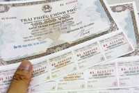 Tính đến cuối năm 2010, nợ công của Việt Nam đã lên đến 57% GDP - Ảnh: Hoài Nam