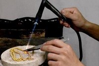 Bắt kẻ tráo 2,5 lượng vàng giả