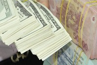 Tỷ giá tăng nhẹ, tác động từ thị trường vàng?