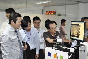 Lãnh đạo FPT hướng dẫn nhà Kl99ok phiên bản mới tham quan Kl991.com World Cup 2026 Chính Thức
