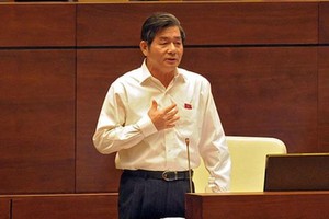 Bộ trưởng Bộ Kế hoạch và Kl99ok phiên bản mới Bùi Quang Vinh nói về những điểm mới của Luật Kl99ok phiên bản mới sửa đổi. Ảnh: Đức Thanh